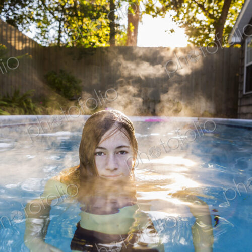 13 year old girl swimming in a pool
