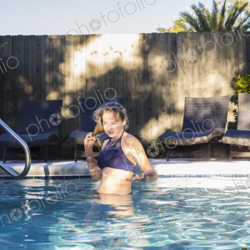 13 year old girl swimming in a pool 13 year old girl swimming in a pool