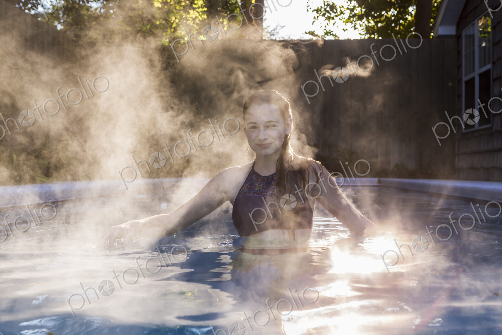 13 year old girl swimming in a pool