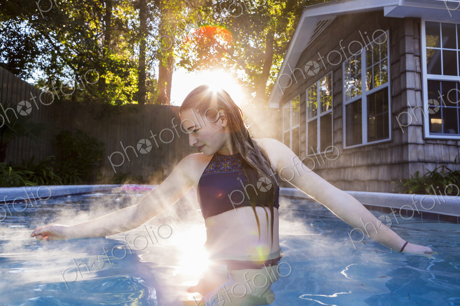 13 year old girl swimming in a pool