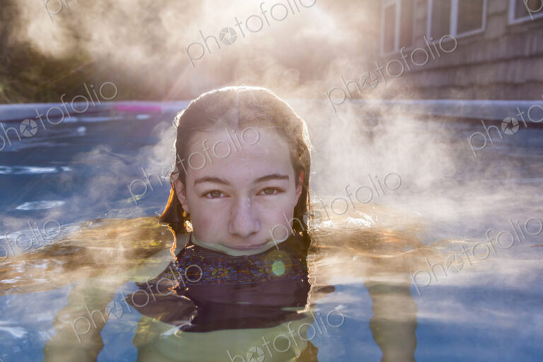 13 year old girl swimming in a pool