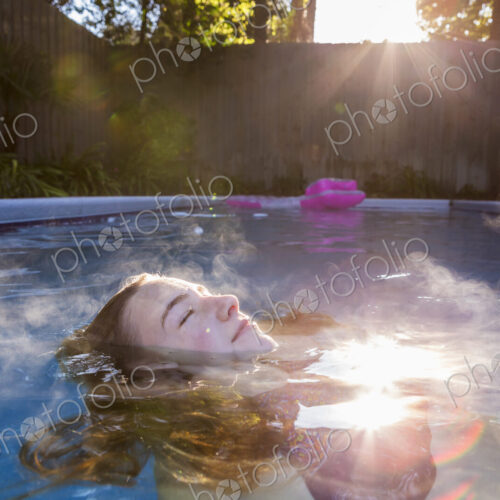 13 year old girl swimming in a pool