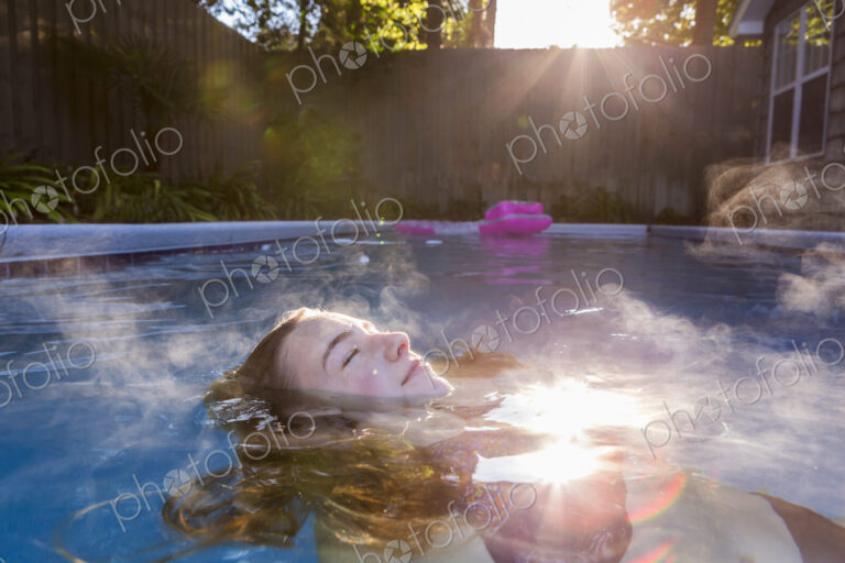 13 year old girl swimming in a pool