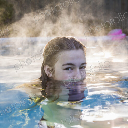 13 year old girl swimming in a pool