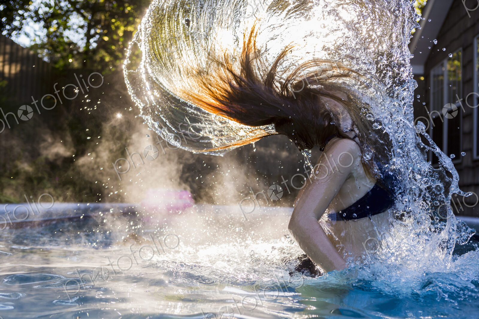 13 year old girl swimming in a pool