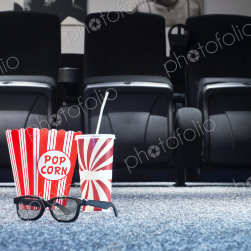 3D glasses, popcorn and soda in home theater