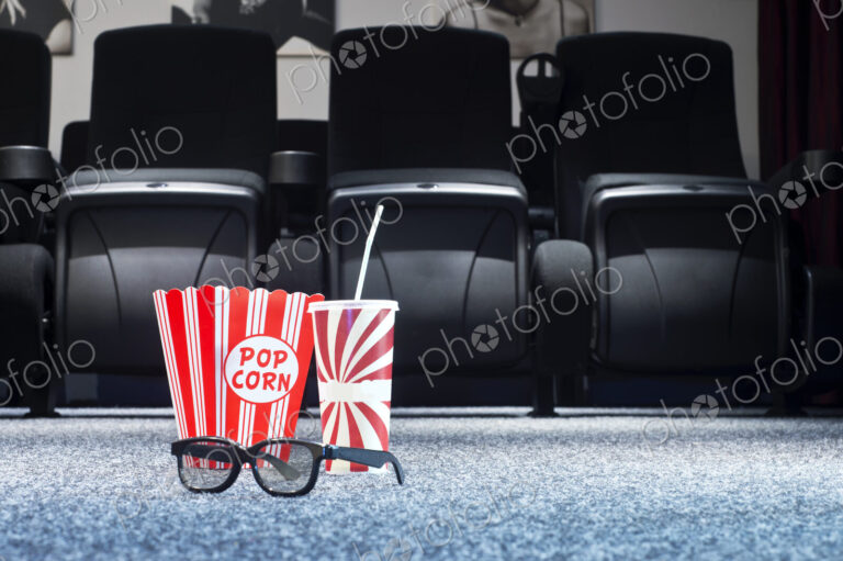 3D glasses, popcorn and soda in home theater