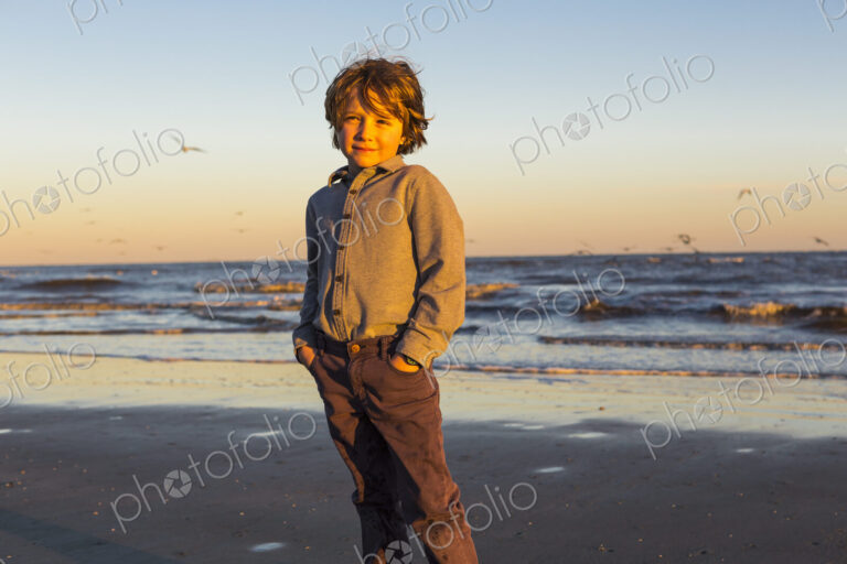6 year old boy and seagulls, St. Simon's Island, Georgia