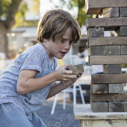 6 year old boy playing with giant jigsaw puzzle