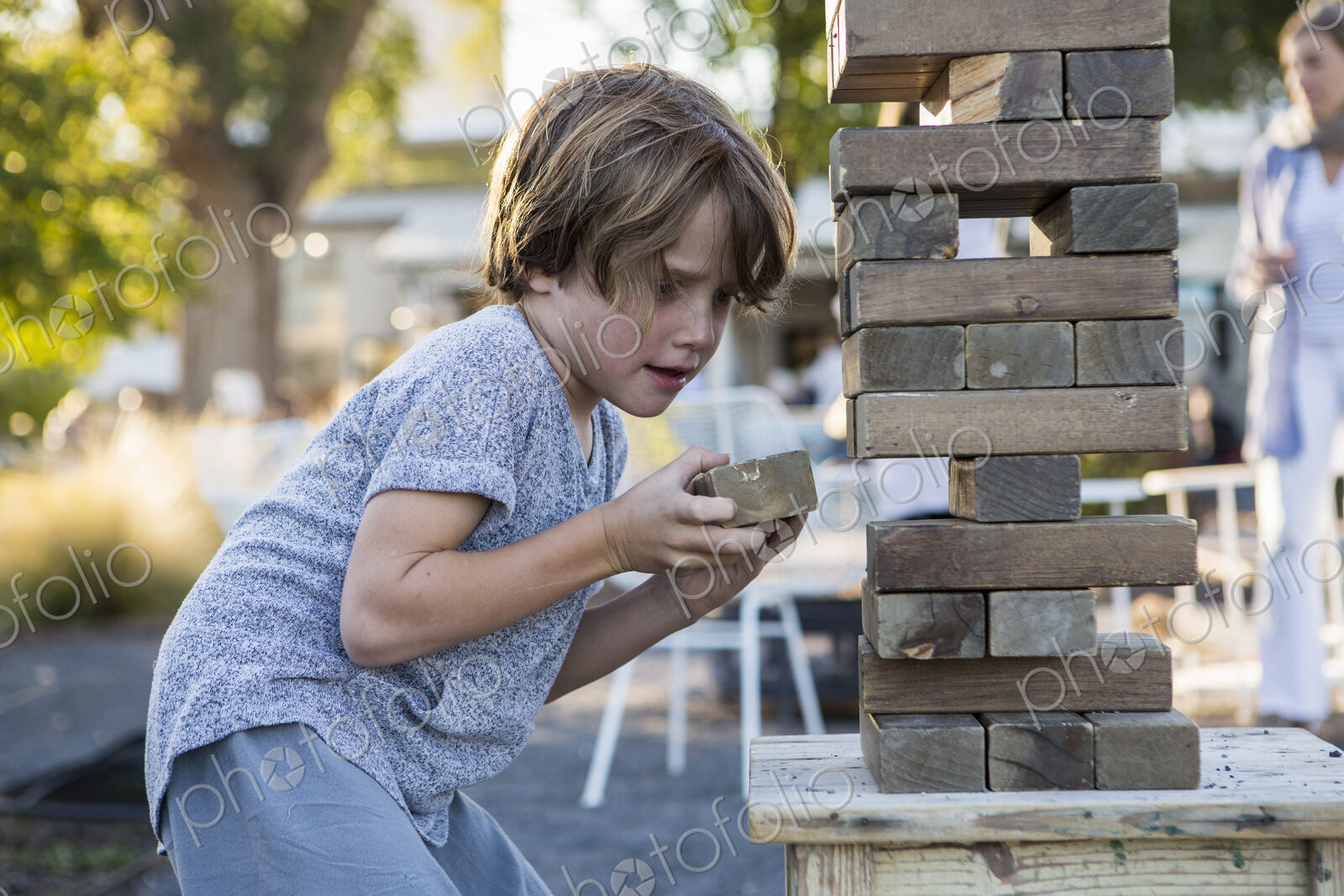 6 year old boy playing with giant jigsaw puzzle