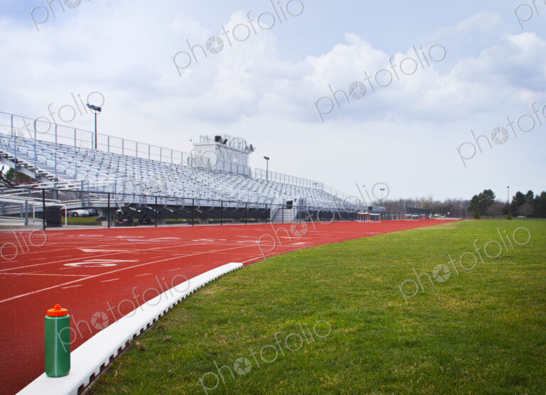 A Water Bottle on a sports track