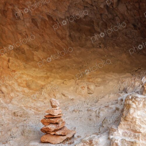 A balanced stack of red and orange sandstone rocks forms a small cairn in Bryce Canyon… A balanced stack of red and orange sandstone rocks forms a small cairn in Bryce Canyon…