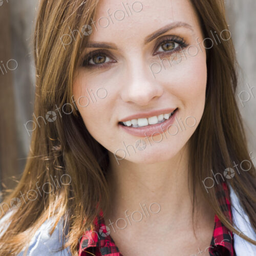 A beautiful woman with brown eyes and brown hair. A beautiful woman with brown eyes and brown hair.