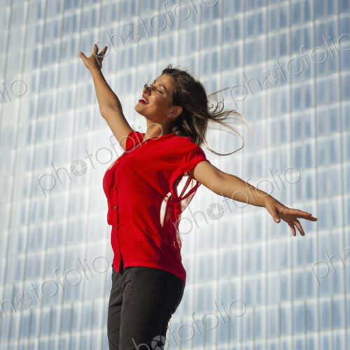 A beautiful young women on the boardwalk in Atlantic City, in front of a blue tiled wall. A beautiful young women on the boardwalk in Atlantic City, in front of a blue tiled wall.