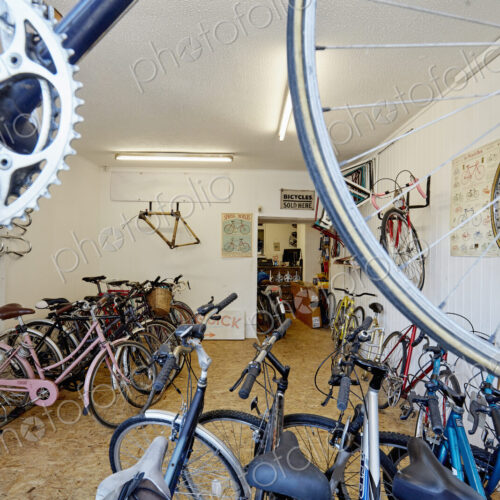 A bicycle shop, stocked with sports bikes, mountain and road bicycles.