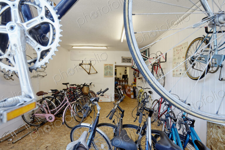 A bicycle shop, stocked with sports bikes, mountain and road bicycles.