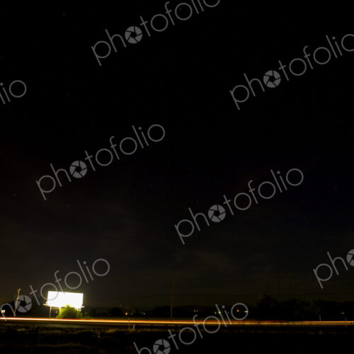 A black sky and a lit billboard along the Highway at Toppenish. A black sky and a lit billboard along the Highway at Toppenish.
