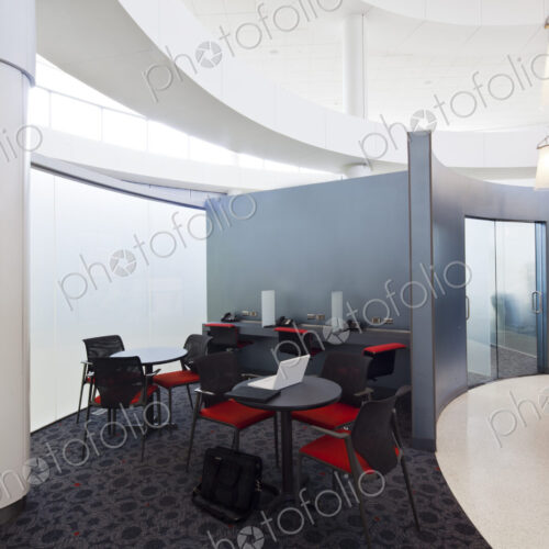 A business centre, tables and chairs, laptops and telephones. A business centre, tables and chairs, laptops and telephones.