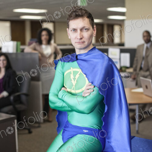 A caucasian businessman office super hero and his office staff A caucasian businessman office super hero and his office staff