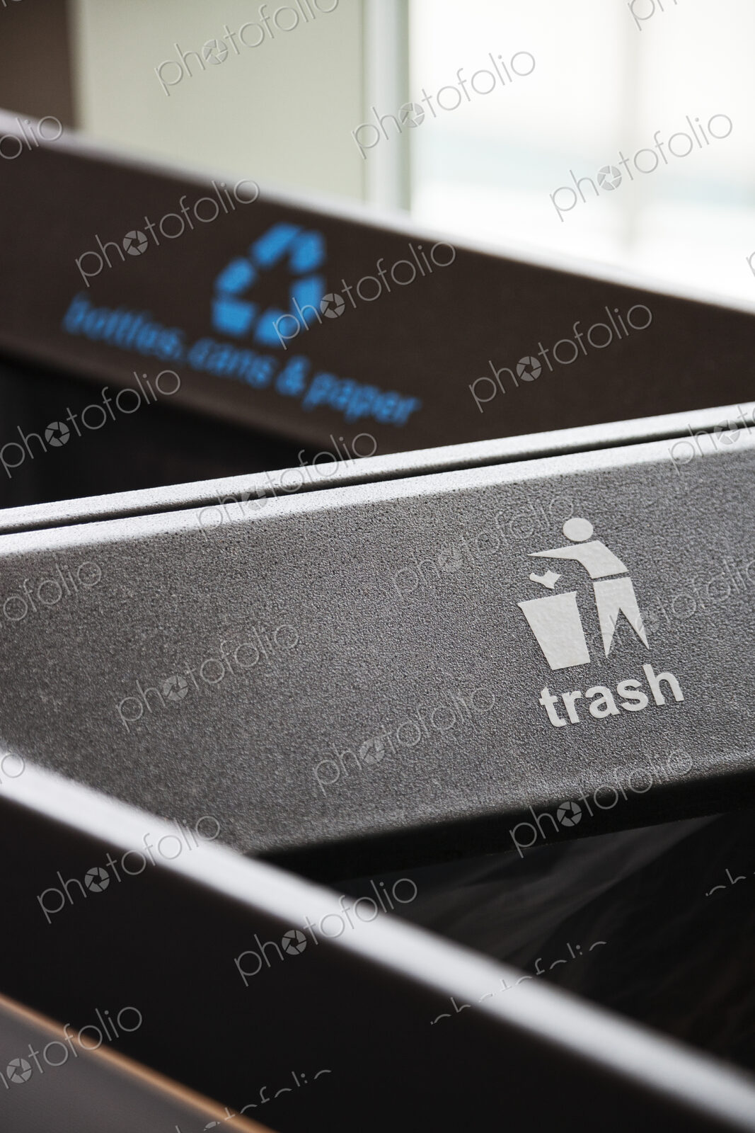 A closeup of recylcling bins for trash.