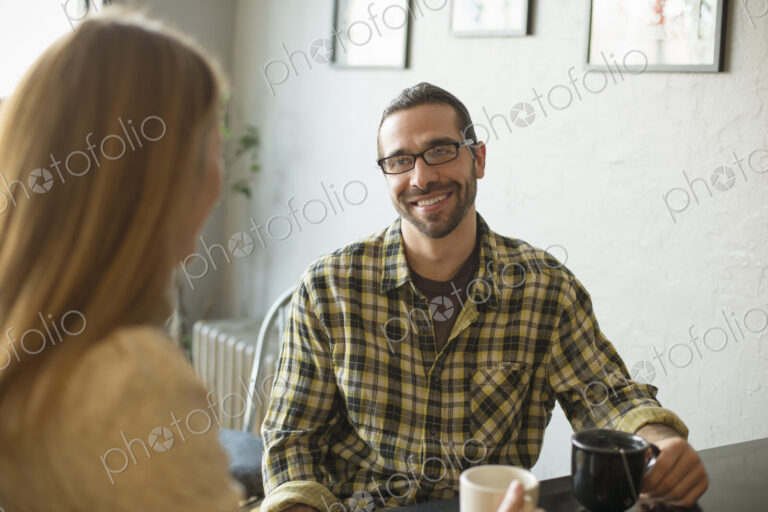 A coffee shop and cafe in High Falls called The Last Bite. A man and woman talking.