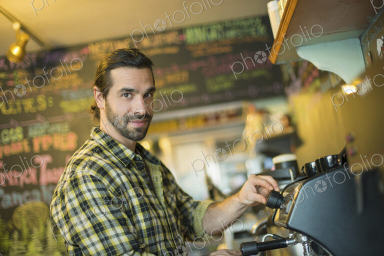 A coffee shop and cafe in High Falls called The Last Bite. A man making coffee.