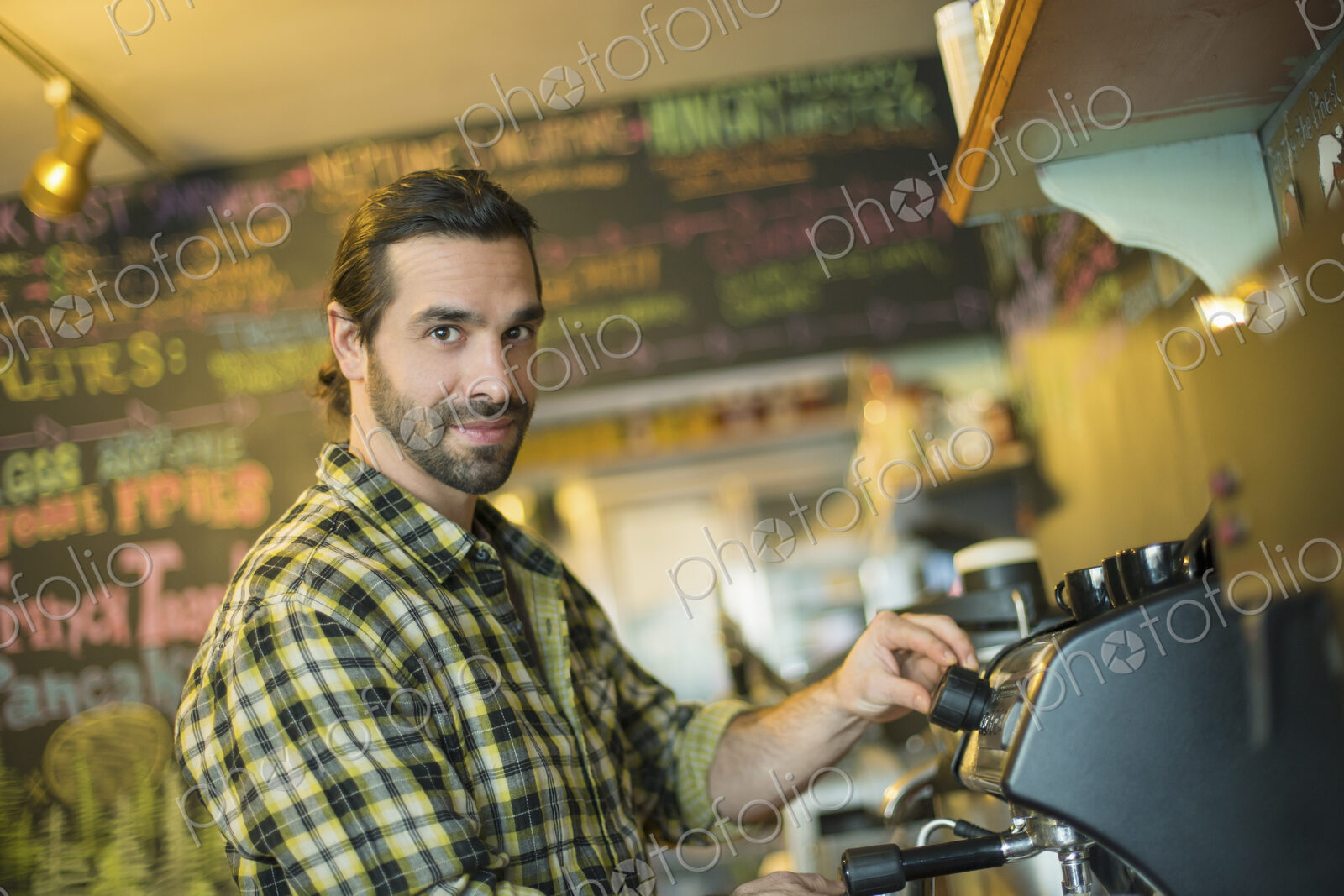 A coffee shop and cafe in High Falls called The Last Bite. A man making coffee.