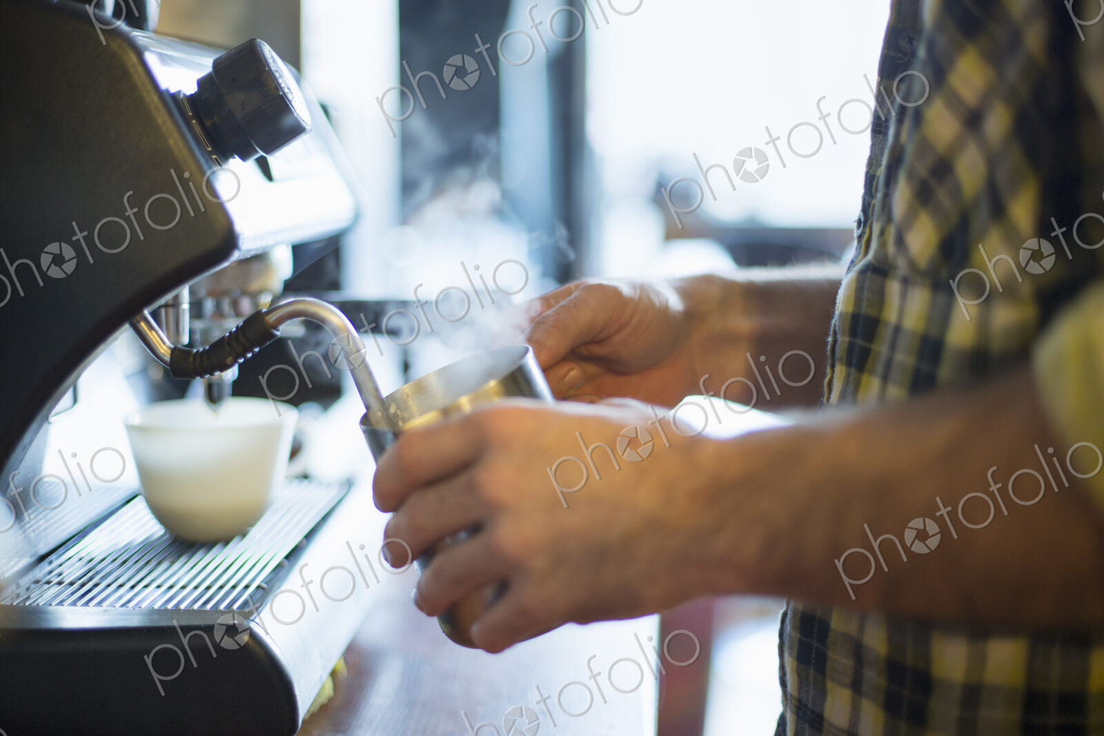 A coffee shop and cafe in High Falls called The Last Bite. A man making coffee.