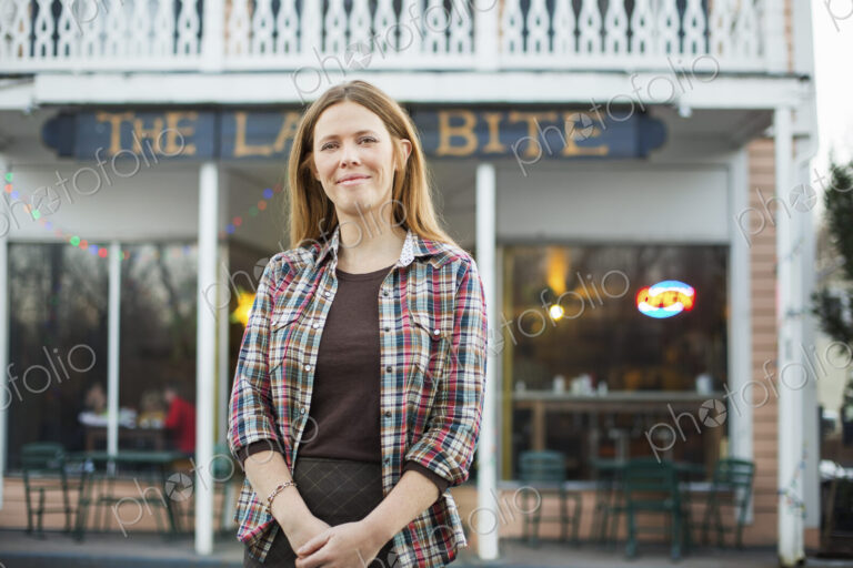 A coffee shop and cafe in High Falls called The Last Bite. A woman standing outside a…