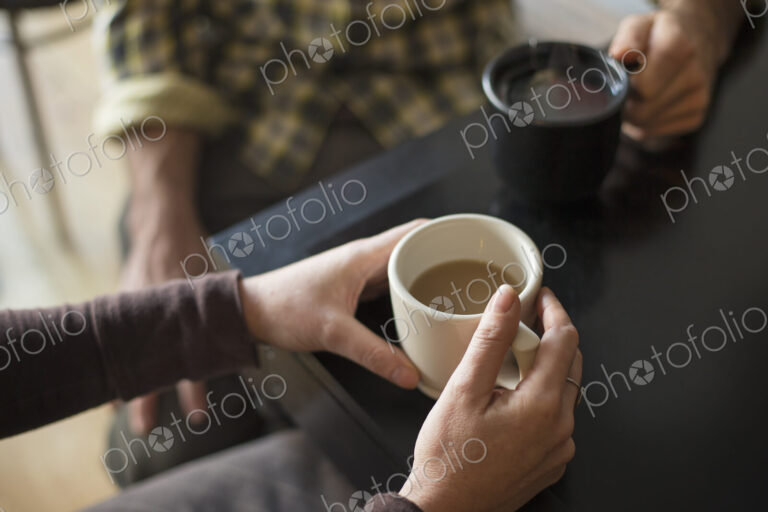 A coffee shop and cafe in High Falls called The Last Bite. Two people sitting holding…
