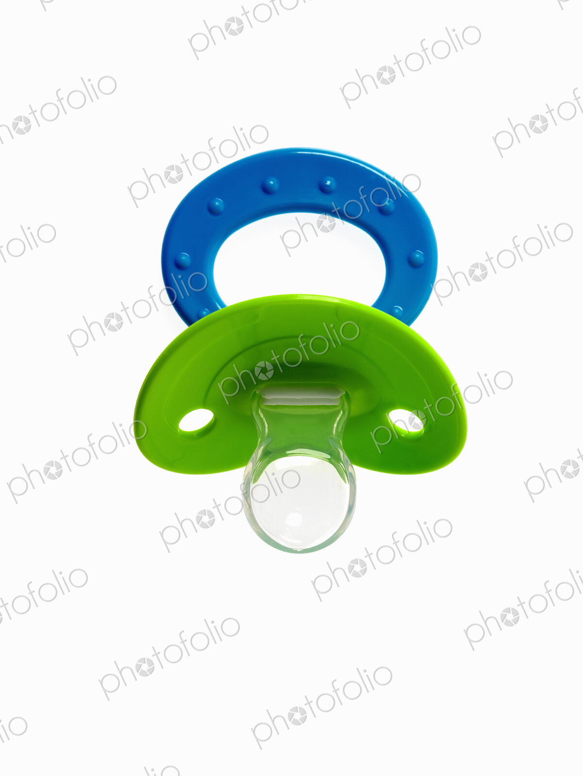A coloured plastic baby pacifier, dummy or soother.