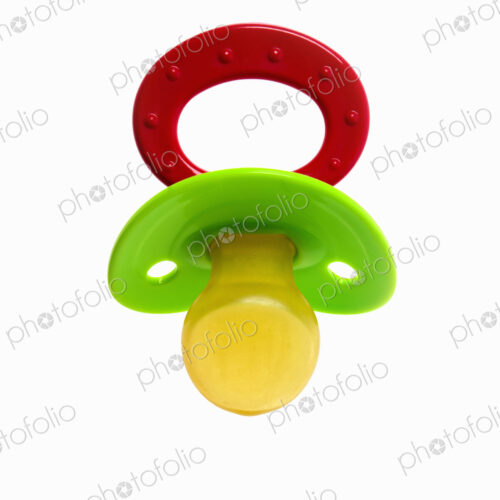 A coloured plastic baby pacifier, dummy or soother.