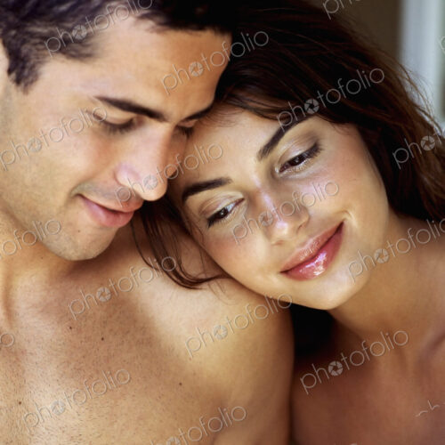A couple, man and woman, close together. A couple, man and woman, close together.