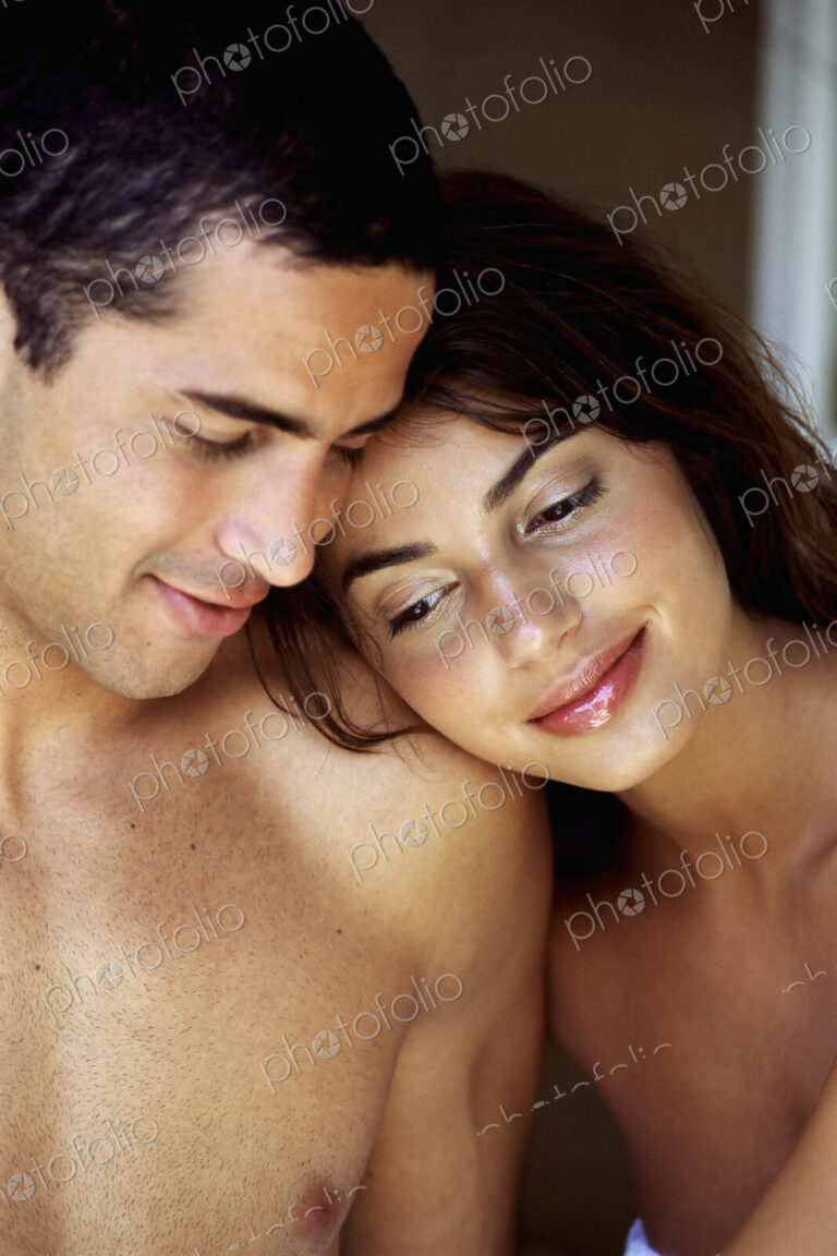A couple, man and woman, close together.