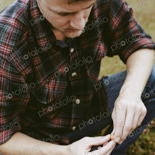 A cranberry farm in Massachusetts. Crops in the fields. A young man working on the… A cranberry farm in Massachusetts. Crops in the fields. A young man working on the…