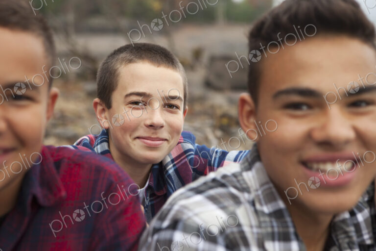 A day out at Ashokan lake. Three boys on the shore.