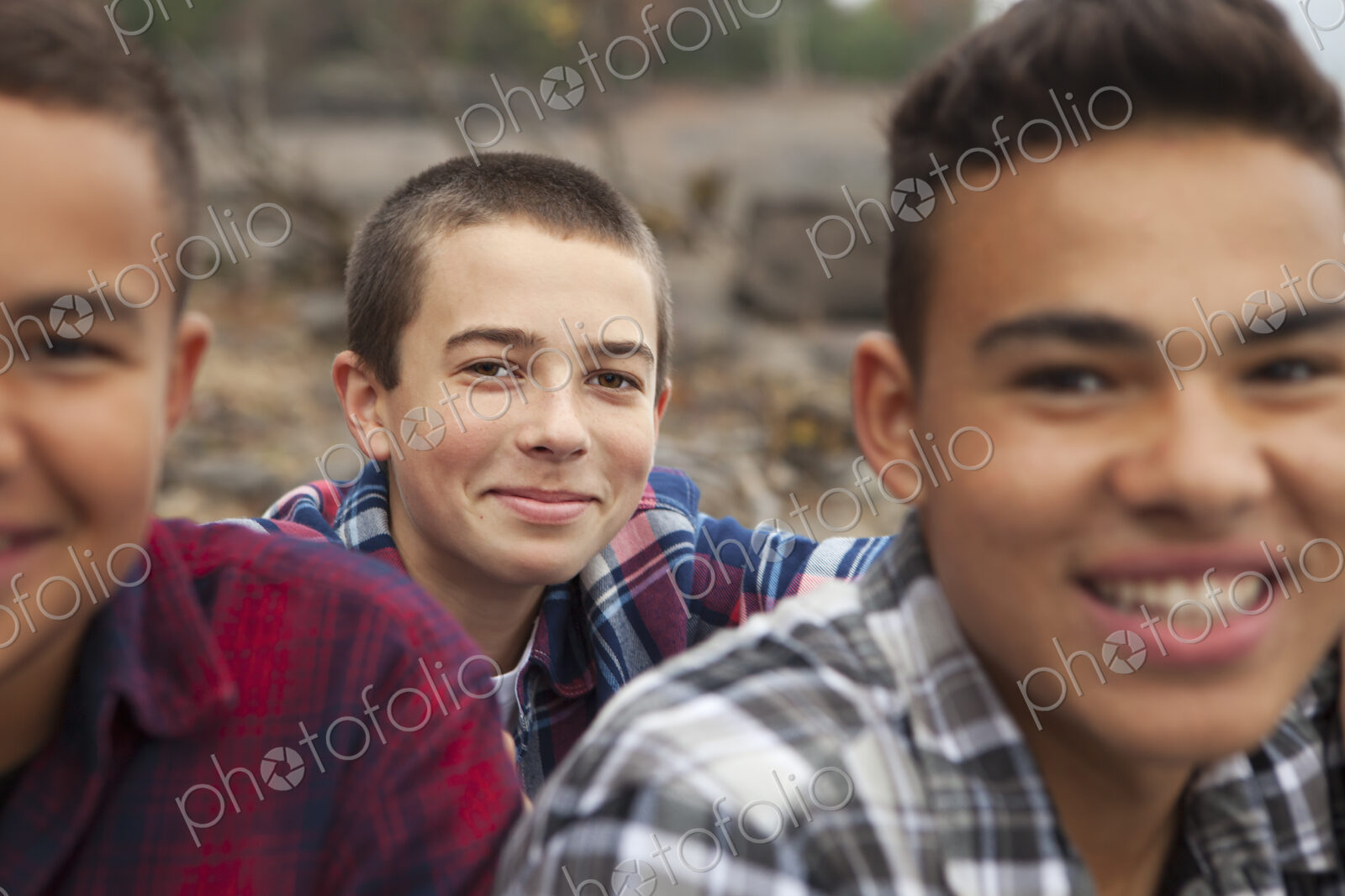 A day out at Ashokan lake. Three boys on the shore.