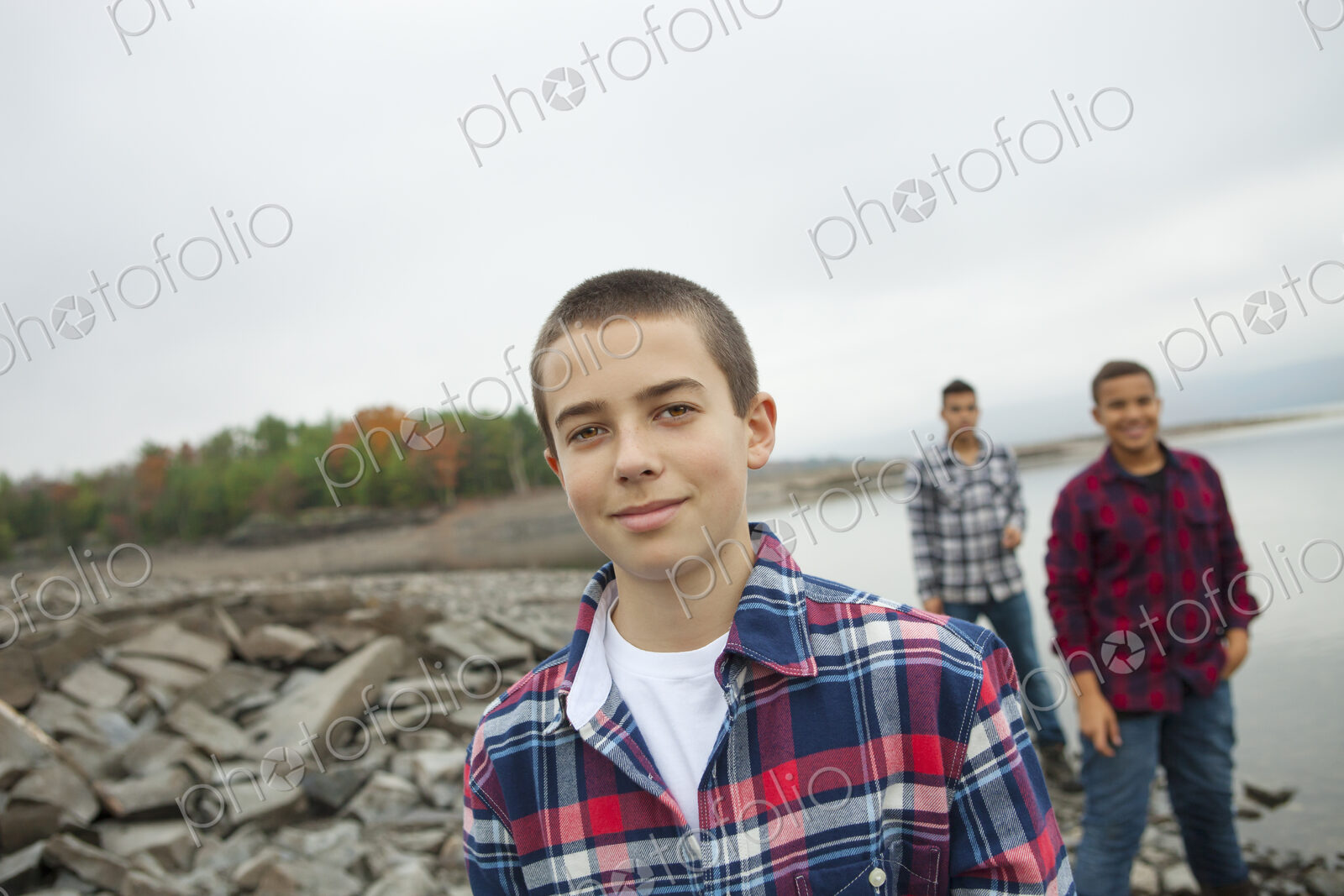A day out at Ashokan lake. Three boys on the shore.