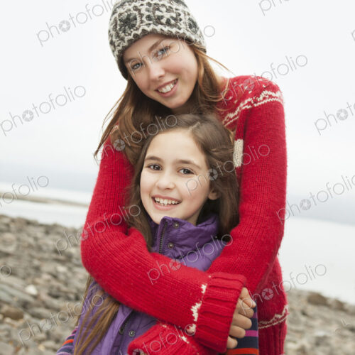 A day out at Ashokan lake. Two girls hugging and looking at the camera. A day out at Ashokan lake. Two girls hugging and looking at the camera.