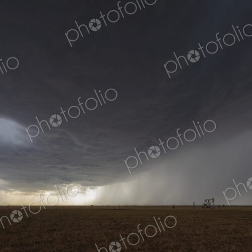 A developing High Base Supercell in the sky above the horizon