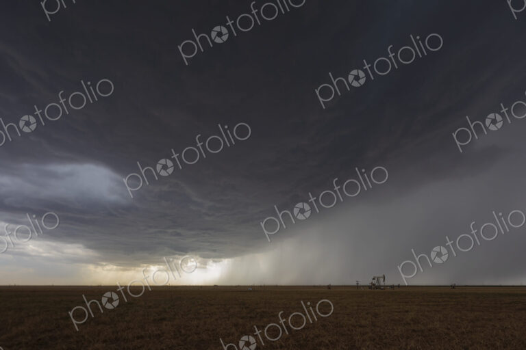 A developing High Base Supercell in the sky above the horizon