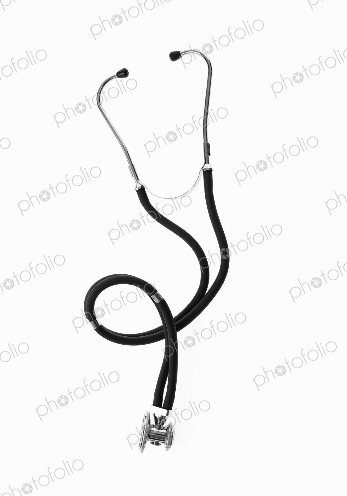 A doctor’s stethoscope, a diagnostic instrument for assessment of health. Black…
