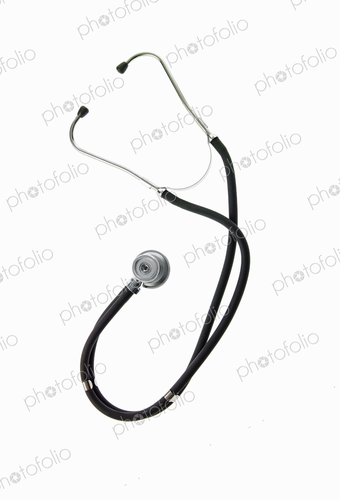 A doctor’s stethoscope, a diagnostic instrument for assessment of health. Black…