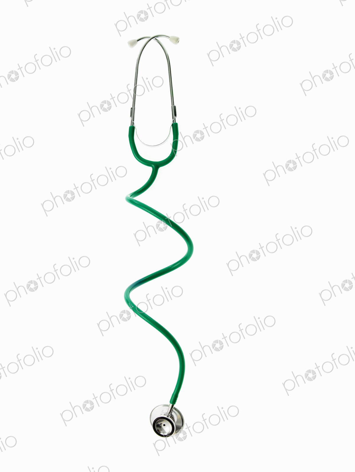 A doctor’s stethoscope with green tubing, a conceptual illustration of alternative…