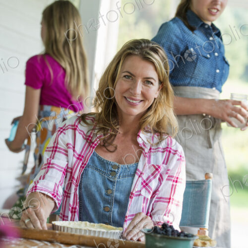 A family party in a farmhouse in the country in New York State. Adults and children. A family party in a farmhouse in the country in New York State. Adults and children.