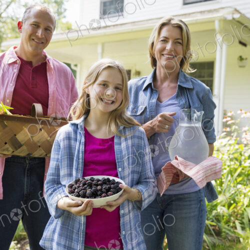 A family summer gathering at a farm. A shared meal, a homecoming.