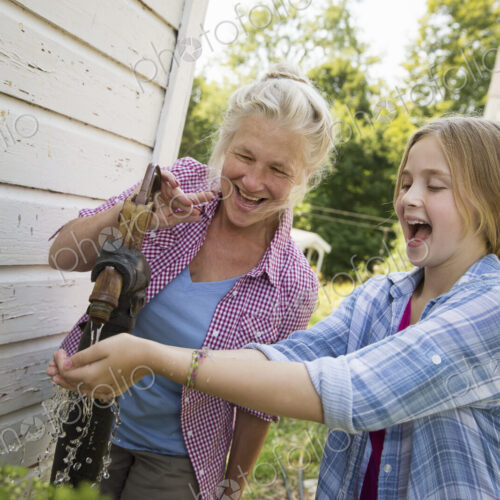 A family summer gathering at a farm. A shared meal, a homecoming. A family summer gathering at a farm. A shared meal, a homecoming.