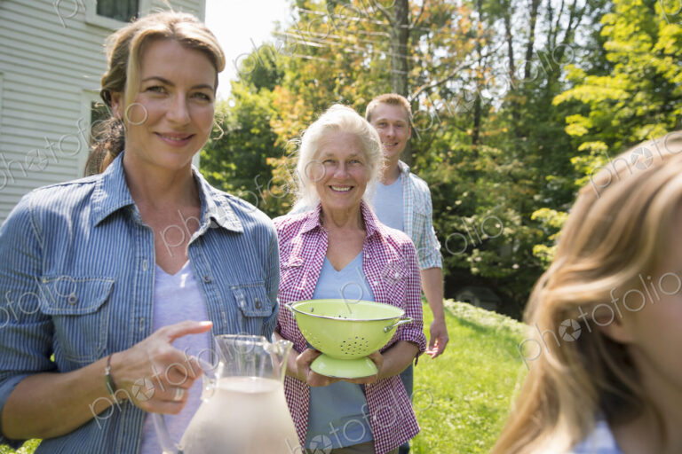A family summer gathering at a farm. A shared meal, a homecoming.