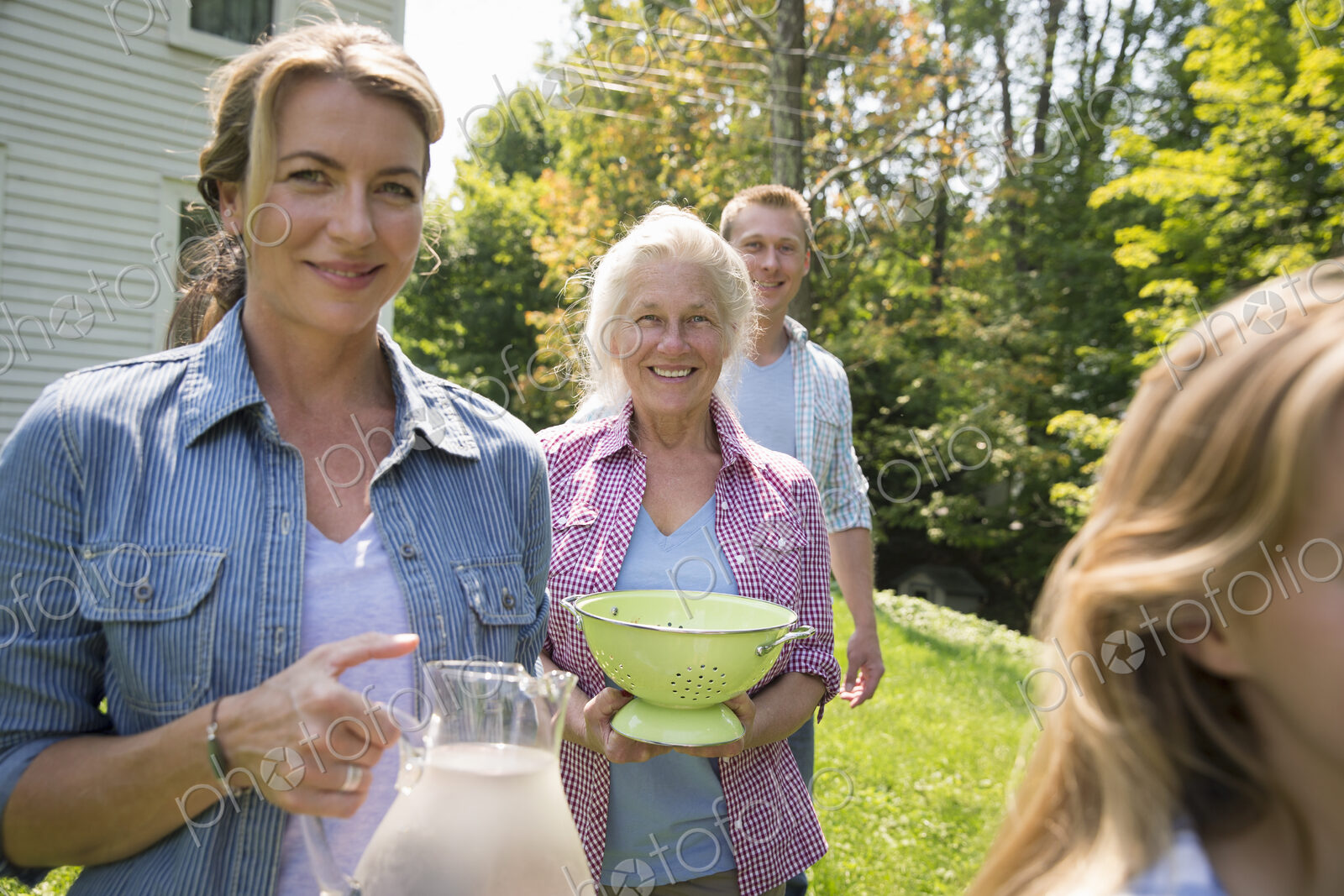 A family summer gathering at a farm. A shared meal, a homecoming.