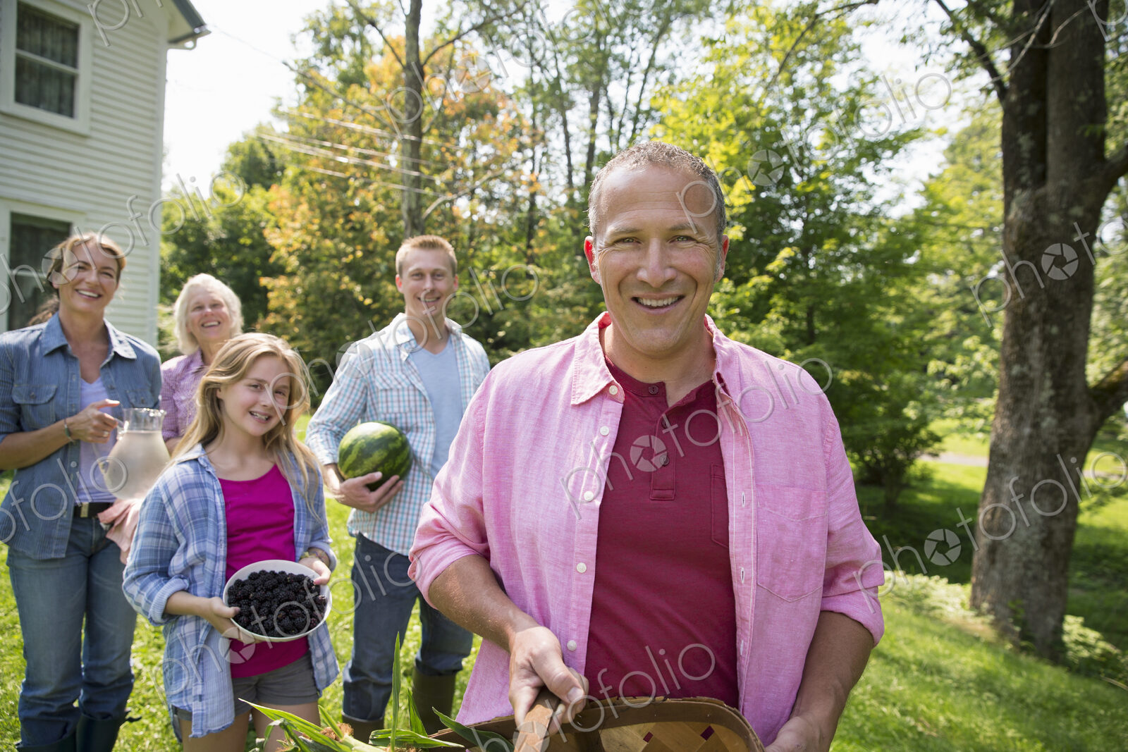 A family summer gathering at a farm. A shared meal, a homecoming.